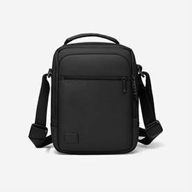 Black modern shoulder bag on white background