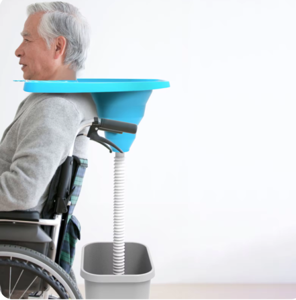 Senior man using assistive portable sink wheel chair