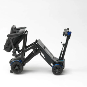 Compact black motorized wheelchair on white background