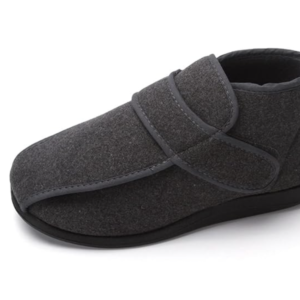 Gray orthopedic shoe with Velcro strap isolated