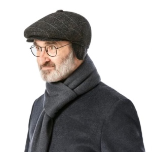 Man wearing glasses and gray flat cap