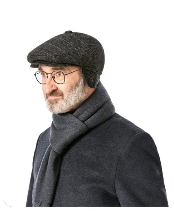 Man wearing glasses and gray flat cap