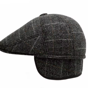 Classic tweed flat cap side view on white