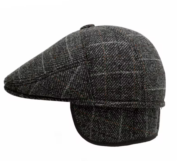 Classic tweed flat cap side view on white