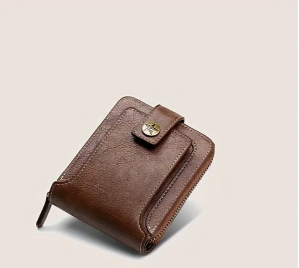 Brown leather wallet on a light background