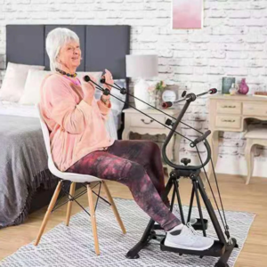 An older woman working out on a stationary bike at home.